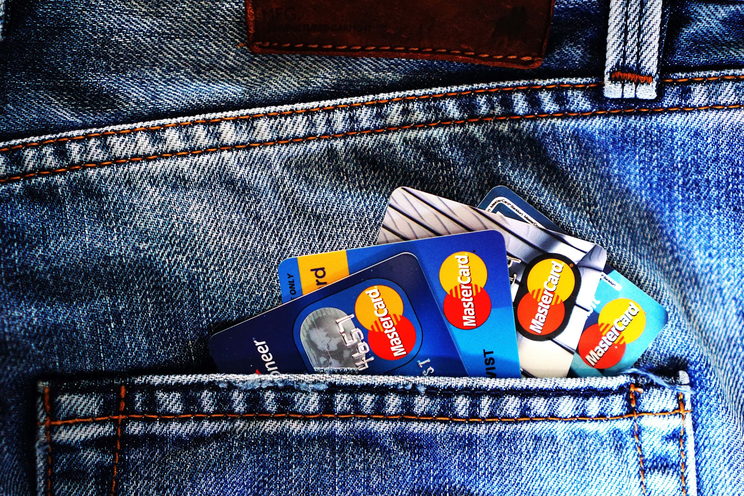 credit cards in a back pocket of a jeans pants