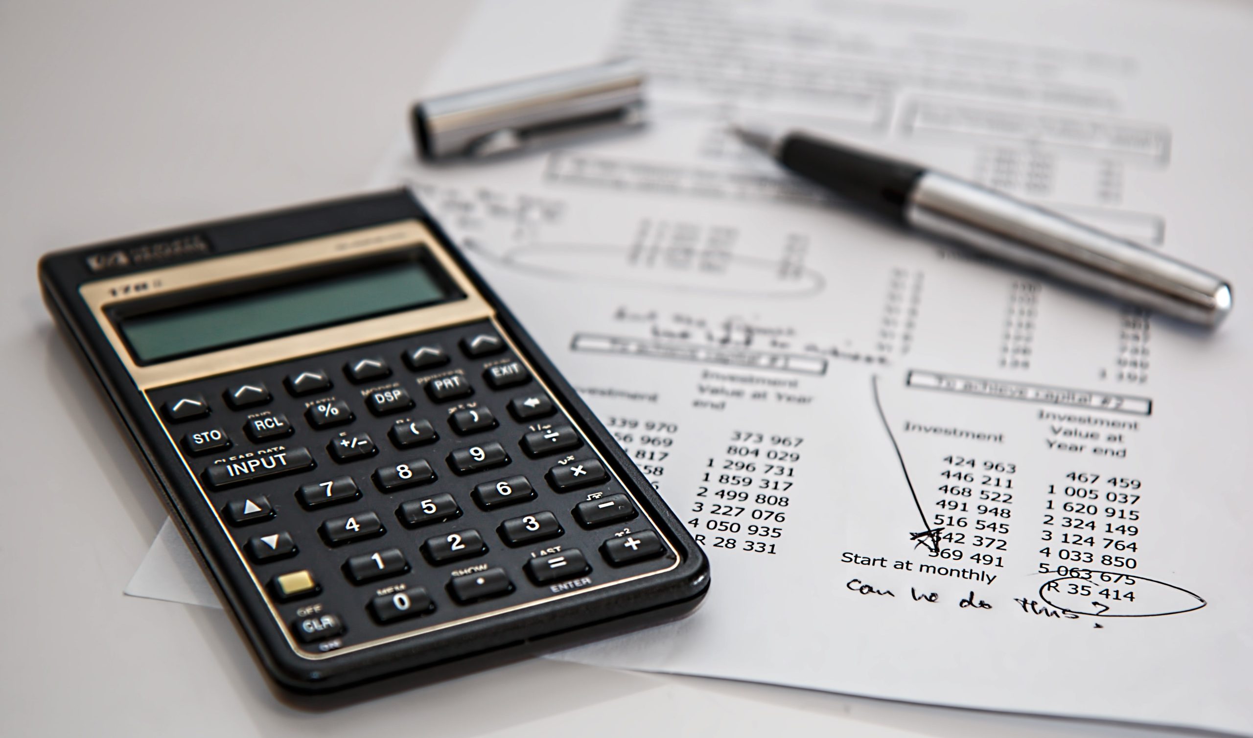 calculator, document, and pen (digitizing financial data with ocr)